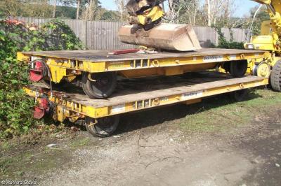 image showing a large yellow on-track machine