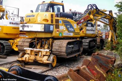 image showing a large yellow on-track machine