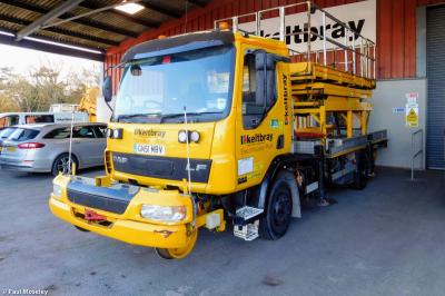 image showing a large yellow on-track machine