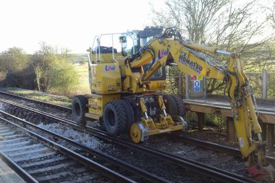 image showing a large yellow on-track machine