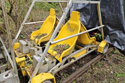 image showing a large yellow on-track machine