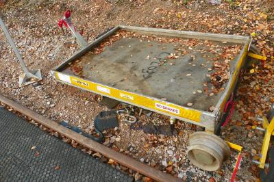 image showing a large yellow on-track machine