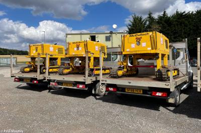 image showing a large yellow on-track machine