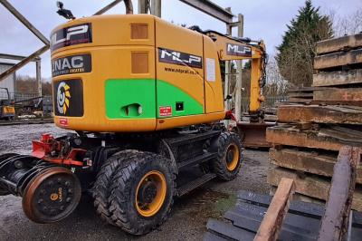 image showing a large yellow on-track machine