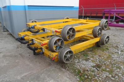 image showing a large yellow on-track machine