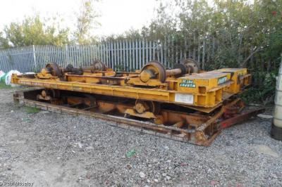 image showing a large yellow on-track machine