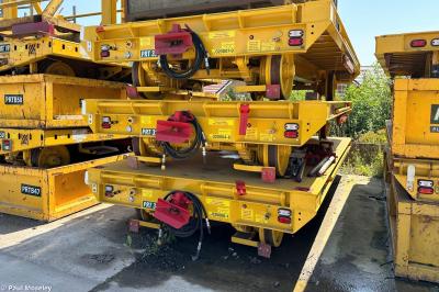image showing a large yellow on-track machine