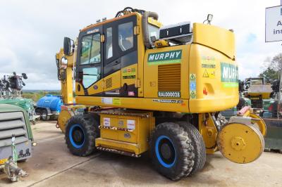 image showing a large yellow on-track machine