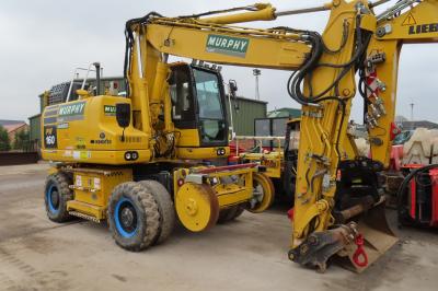 image showing a large yellow on-track machine