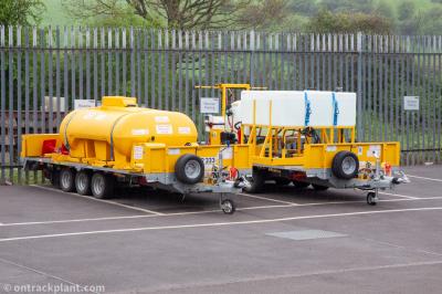 image showing a large yellow on-track machine