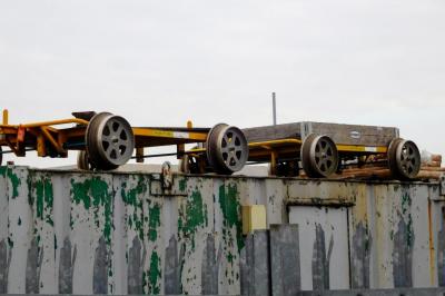 image showing a large yellow on-track machine