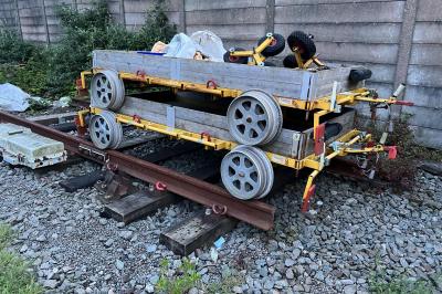 image showing a large yellow on-track machine