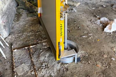 image showing a large yellow on-track machine