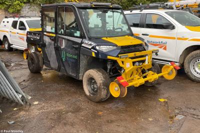 image showing a large yellow on-track machine