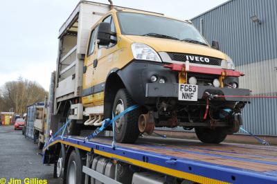 image showing a large yellow on-track machine