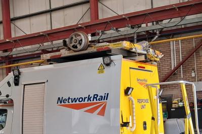 image showing a large yellow on-track machine