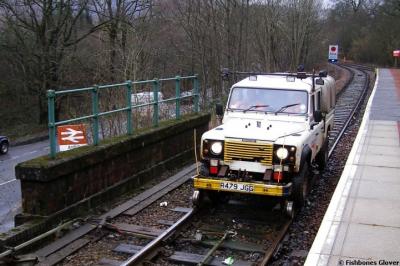 image showing a large yellow on-track machine