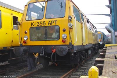 image showing a large yellow on-track machine