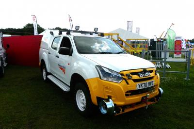 image showing a large yellow on-track machine