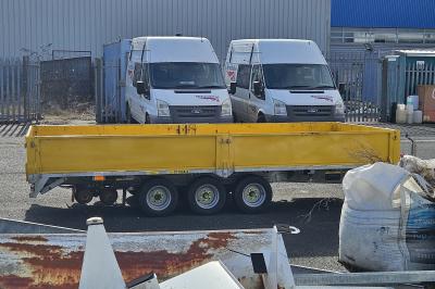 image showing a large yellow on-track machine