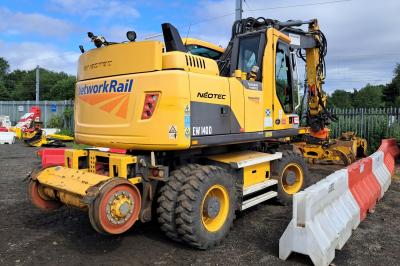 image showing a large yellow on-track machine