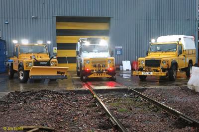 image showing a large yellow on-track machine