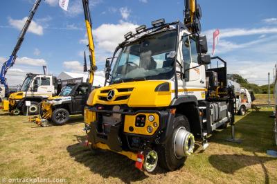 image showing a large yellow on-track machine