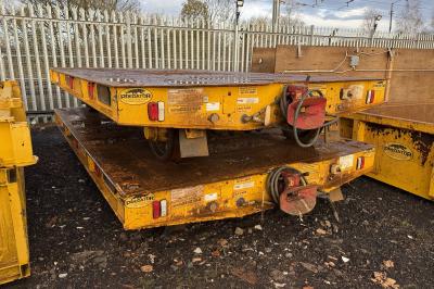 image showing a large yellow on-track machine