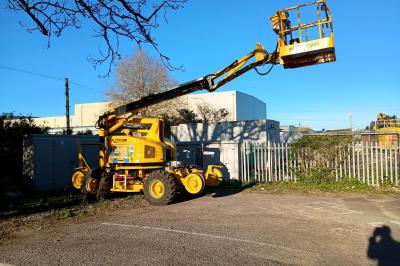 image showing a large yellow on-track machine