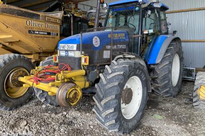 image showing a large yellow on-track machine