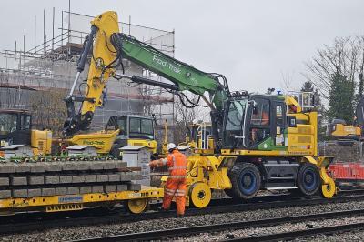 image showing a large yellow on-track machine