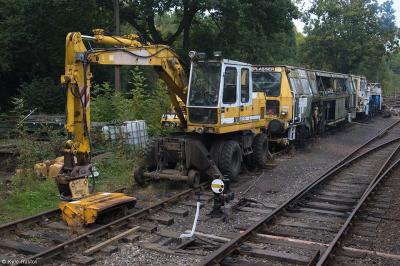 image showing a large yellow on-track machine