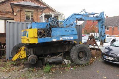 image showing a large yellow on-track machine