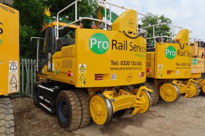 image showing a large yellow on-track machine