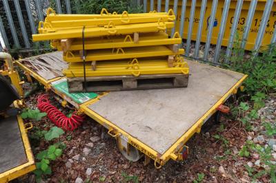 image showing a large yellow on-track machine
