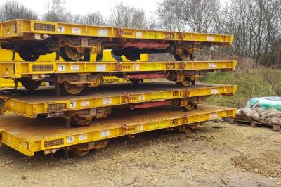 image showing a large yellow on-track machine