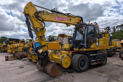 image showing a large yellow on-track machine