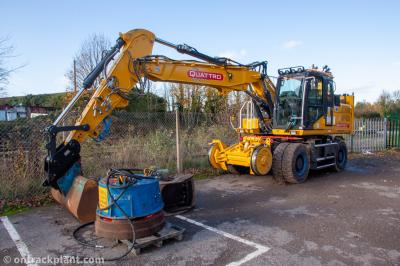 image showing a large yellow on-track machine