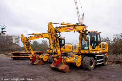 image showing a large yellow on-track machine