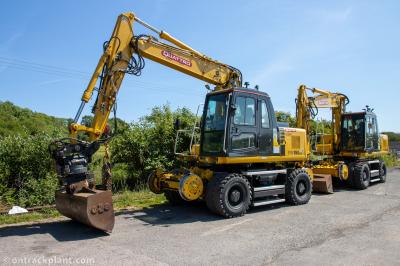 image showing a large yellow on-track machine