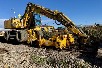 image showing a large yellow on-track machine