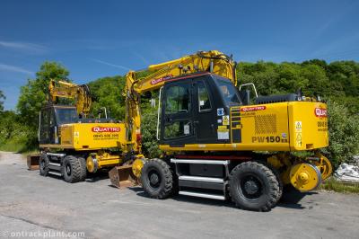 image showing a large yellow on-track machine