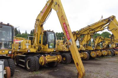 image showing a large yellow on-track machine