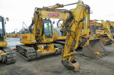 image showing a large yellow on-track machine