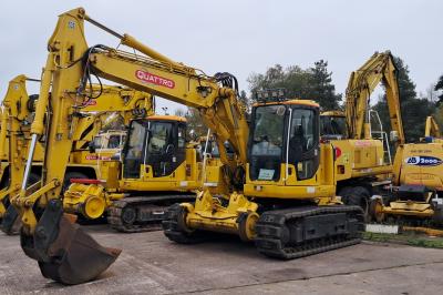 image showing a large yellow on-track machine