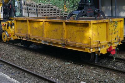 image showing a large yellow on-track machine