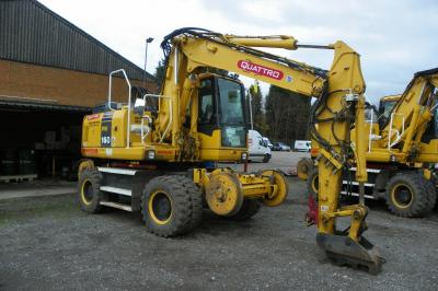 image showing a large yellow on-track machine