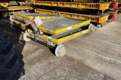 image showing a large yellow on-track machine