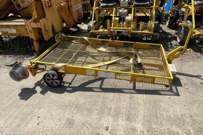 image showing a large yellow on-track machine