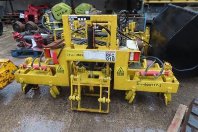 image showing a large yellow on-track machine